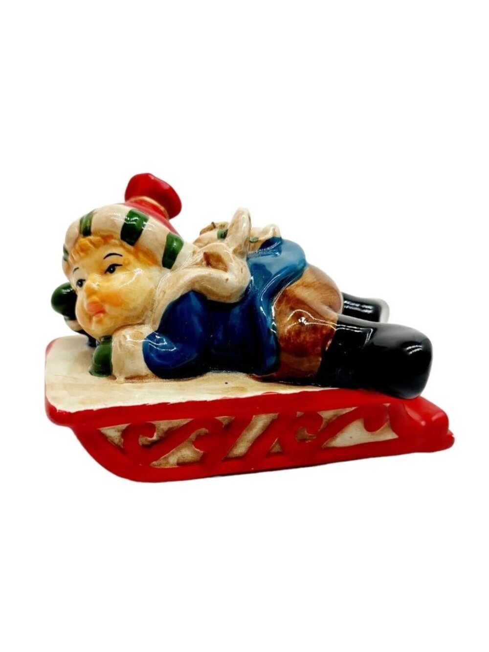 Vintage Boy Lying On red white Sled Figurine Christmas ornament winter